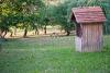 Abandoned wooden building near a park - Old wooden building