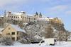 View of a castle of a city in winter time - Winter castle