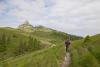 Faithful hiking companion - A man and a cat are hiking in the mountains