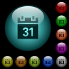 Calendar icons in color illuminated glass buttons - Calendar icons in color illuminated spherical glass buttons on black background. Can be used to black or dark templates