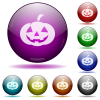 Halloween pumpkin icon in glass sphere buttons - Halloween pumpkin icons in color glass sphere buttons with shadows