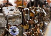 Love lock hanging on the rail. - Padlock