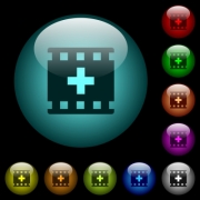 Add new movie icons in color illuminated spherical glass buttons on black background. Can be used to black or dark templates - Add new movie icons in color illuminated glass buttons