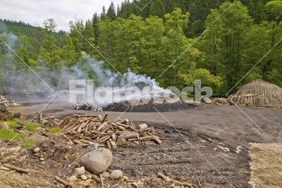 Smoking charcoal pile - A charcoal pile during combustion